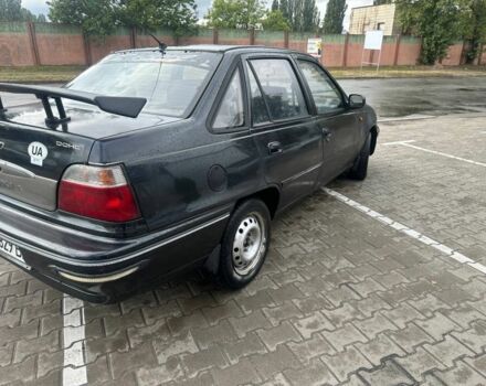 Черный Дэу Нексия, объемом двигателя 1.5 л и пробегом 213 тыс. км за 850 $, фото 1 на Automoto.ua