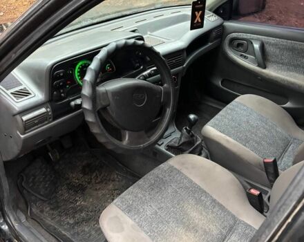 Черный Дэу Нексия, объемом двигателя 1.5 л и пробегом 570 тыс. км за 950 $, фото 6 на Automoto.ua