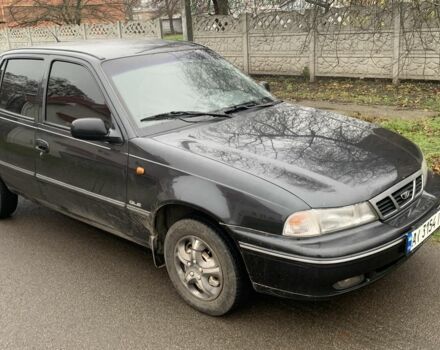 Черный Дэу Нексия, объемом двигателя 1.5 л и пробегом 200 тыс. км за 999 $, фото 2 на Automoto.ua