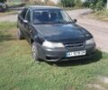 Черный Дэу Нексия, объемом двигателя 1.5 л и пробегом 100 тыс. км за 1398 $, фото 1 на Automoto.ua
