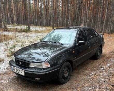 Черный Дэу Нексия, объемом двигателя 1.5 л и пробегом 570 тыс. км за 950 $, фото 1 на Automoto.ua