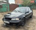 Черный Дэу Нексия, объемом двигателя 1.5 л и пробегом 212 тыс. км за 1198 $, фото 2 на Automoto.ua