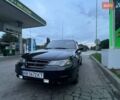 Черный Дэу Нексия, объемом двигателя 1.5 л и пробегом 298 тыс. км за 2200 $, фото 1 на Automoto.ua