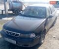 Черный Дэу Нексия, объемом двигателя 1.5 л и пробегом 166 тыс. км за 600 $, фото 1 на Automoto.ua
