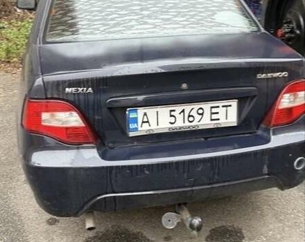 Чорний Деу Нексія, об'ємом двигуна 1.5 л та пробігом 200 тис. км за 1650 $, фото 1 на Automoto.ua