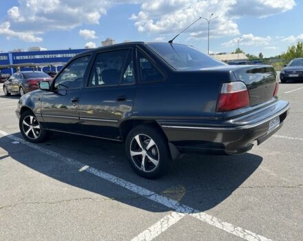 Чорний Деу Нексія, об'ємом двигуна 1.5 л та пробігом 140 тис. км за 2650 $, фото 3 на Automoto.ua