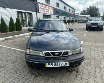 Черный Дэу Нексия, объемом двигателя 1.5 л и пробегом 213 тыс. км за 850 $, фото 2 на Automoto.ua