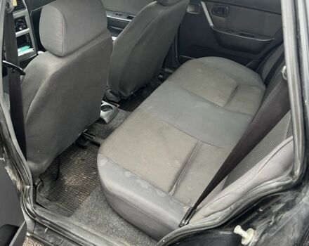 Черный Дэу Нексия, объемом двигателя 1.5 л и пробегом 305 тыс. км за 2200 $, фото 5 на Automoto.ua