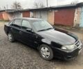 Черный Дэу Нексия, объемом двигателя 1.5 л и пробегом 305 тыс. км за 2200 $, фото 1 на Automoto.ua