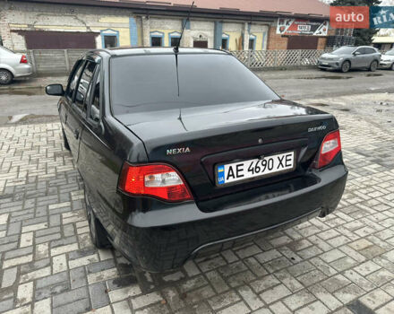 Чорний Деу Нексія, об'ємом двигуна 1.5 л та пробігом 260 тис. км за 2000 $, фото 1 на Automoto.ua