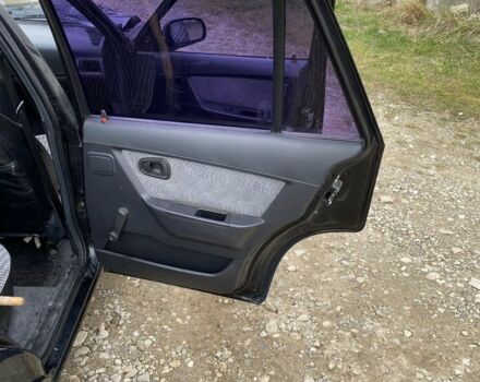 Черный Дэу Нексия, объемом двигателя 1.5 л и пробегом 90 тыс. км за 800 $, фото 8 на Automoto.ua