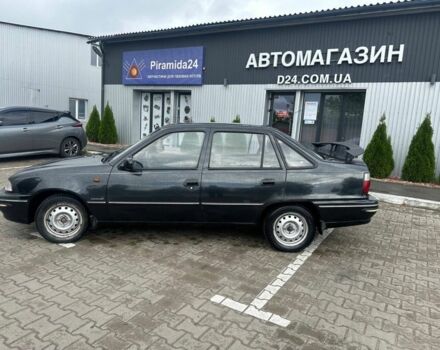 Черный Дэу Нексия, объемом двигателя 1.5 л и пробегом 213 тыс. км за 850 $, фото 6 на Automoto.ua