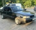 Чорний Деу Нексія, об'ємом двигуна 1.6 л та пробігом 172 тис. км за 1600 $, фото 1 на Automoto.ua