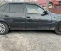 Черный Дэу Нексия, объемом двигателя 1.5 л и пробегом 330 тыс. км за 1900 $, фото 9 на Automoto.ua