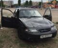 Чорний Деу Нексія, об'ємом двигуна 1.5 л та пробігом 200 тис. км за 1087 $, фото 1 на Automoto.ua