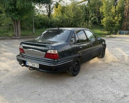 Чорний Деу Нексія, об'ємом двигуна 1.5 л та пробігом 200 тис. км за 1150 $, фото 1 на Automoto.ua