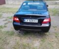 Черный Дэу Нексия, объемом двигателя 1.5 л и пробегом 215 тыс. км за 1750 $, фото 3 на Automoto.ua