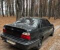 Черный Дэу Нексия, объемом двигателя 1.5 л и пробегом 570 тыс. км за 950 $, фото 4 на Automoto.ua
