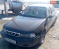 Черный Дэу Нексия, объемом двигателя 1.5 л и пробегом 166 тыс. км за 600 $, фото 1 на Automoto.ua