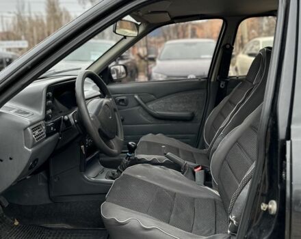 Черный Дэу Нексия, объемом двигателя 1.5 л и пробегом 210 тыс. км за 2450 $, фото 5 на Automoto.ua