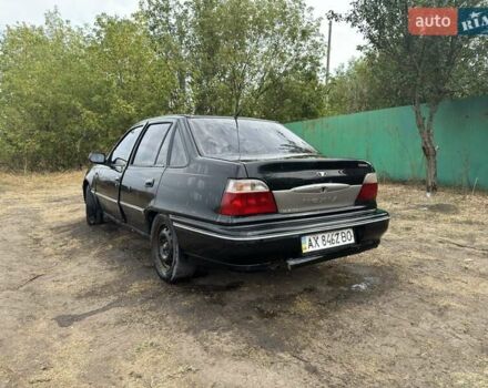 Черный Дэу Нексия, объемом двигателя 1.5 л и пробегом 212 тыс. км за 1198 $, фото 5 на Automoto.ua