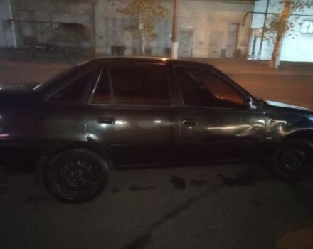 Чорний Деу Нексія, об'ємом двигуна 0 л та пробігом 220 тис. км за 1200 $, фото 5 на Automoto.ua