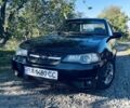 Чорний Деу Нексія, об'ємом двигуна 1.5 л та пробігом 360 тис. км за 1555 $, фото 1 на Automoto.ua