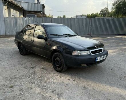 Чорний Деу Нексія, об'ємом двигуна 1.5 л та пробігом 200 тис. км за 1150 $, фото 2 на Automoto.ua