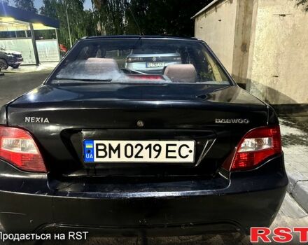 Чорний Деу Нексія, об'ємом двигуна 1.5 л та пробігом 240 тис. км за 950 $, фото 4 на Automoto.ua
