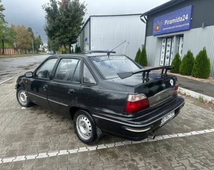 Черный Дэу Нексия, объемом двигателя 1.5 л и пробегом 213 тыс. км за 850 $, фото 7 на Automoto.ua