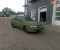 Черный Дэу Нексия, объемом двигателя 1.5 л и пробегом 467 тыс. км за 1450 $, фото 2 на Automoto.ua