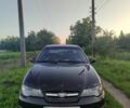 Черный Дэу Нексия, объемом двигателя 1.5 л и пробегом 200 тыс. км за 998 $, фото 1 на Automoto.ua