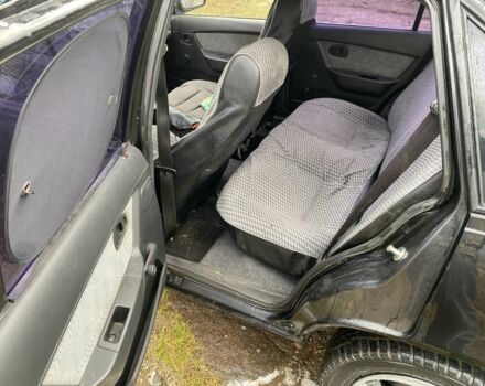 Черный Дэу Нексия, объемом двигателя 1.5 л и пробегом 90 тыс. км за 800 $, фото 12 на Automoto.ua