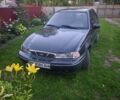 Чорний Деу Нексія, об'ємом двигуна 1.5 л та пробігом 193 тис. км за 1250 $, фото 1 на Automoto.ua