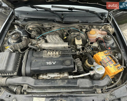 Чорний Деу Нексія, об'ємом двигуна 1.5 л та пробігом 260 тис. км за 2000 $, фото 5 на Automoto.ua