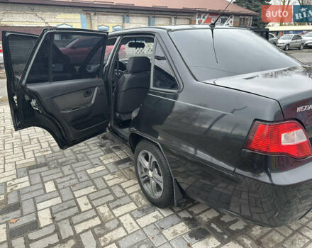Чорний Деу Нексія, об'ємом двигуна 1.5 л та пробігом 260 тис. км за 2000 $, фото 14 на Automoto.ua