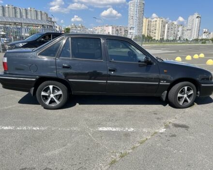 Чорний Деу Нексія, об'ємом двигуна 1.5 л та пробігом 140 тис. км за 2650 $, фото 1 на Automoto.ua