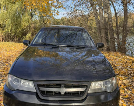 Чорний Деу Нексія, об'ємом двигуна 1.5 л та пробігом 230 тис. км за 1880 $, фото 1 на Automoto.ua