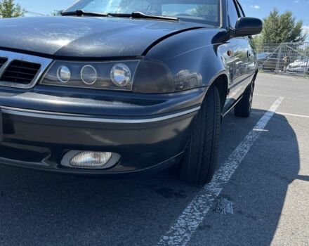 Чорний Деу Нексія, об'ємом двигуна 1.5 л та пробігом 140 тис. км за 2650 $, фото 2 на Automoto.ua