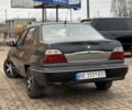 Черный Дэу Нексия, объемом двигателя 1.5 л и пробегом 210 тыс. км за 2450 $, фото 2 на Automoto.ua