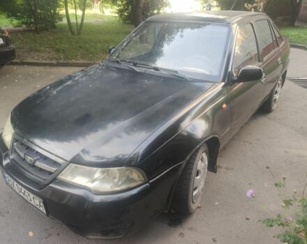 Черный Дэу Нексия, объемом двигателя 1.6 л и пробегом 237 тыс. км за 1300 $, фото 2 на Automoto.ua