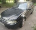 Черный Дэу Нексия, объемом двигателя 1.6 л и пробегом 237 тыс. км за 1300 $, фото 2 на Automoto.ua