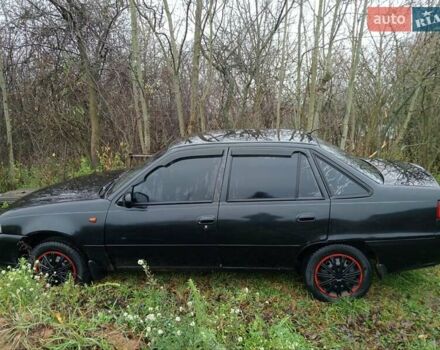 Чорний Деу Нексія, об'ємом двигуна 1.6 л та пробігом 378 тис. км за 1400 $, фото 6 на Automoto.ua