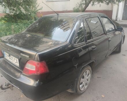Черный Дэу Нексия, объемом двигателя 1.6 л и пробегом 237 тыс. км за 1300 $, фото 4 на Automoto.ua