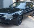 Чорний Деу Нексія, об'ємом двигуна 1.5 л та пробігом 390 тис. км за 1700 $, фото 1 на Automoto.ua