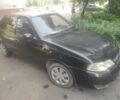 Чорний Деу Нексія, об'ємом двигуна 1.6 л та пробігом 237 тис. км за 1500 $, фото 1 на Automoto.ua