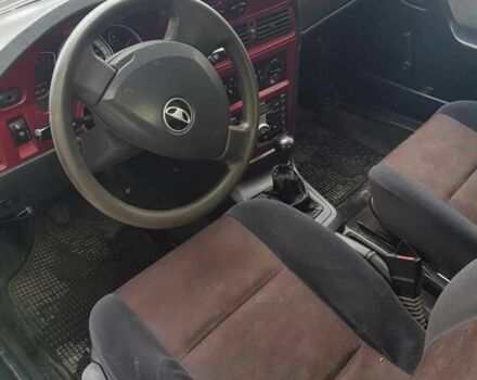 Черный Дэу Нексия, объемом двигателя 1.6 л и пробегом 237 тыс. км за 1300 $, фото 10 на Automoto.ua