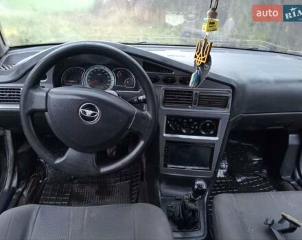 Чорний Деу Нексія, об'ємом двигуна 1.6 л та пробігом 378 тис. км за 1400 $, фото 4 на Automoto.ua