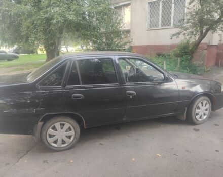 Черный Дэу Нексия, объемом двигателя 1.6 л и пробегом 237 тыс. км за 1300 $, фото 3 на Automoto.ua