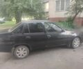 Черный Дэу Нексия, объемом двигателя 1.6 л и пробегом 237 тыс. км за 1300 $, фото 3 на Automoto.ua